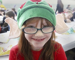 William D Lewis The Vindicator Emily Chambers, 2nd grade, sports elf ears during Struthers Rotary Christmas party 12-17-13 at Struthers Presbyterian Church.She is a student at Austintown elem School.