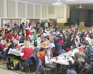 William D Lewis The Vindicator More than 200 students from MAhoning County attended the Struthers Rotary Christmas party 12-17-13 at Struthes Presbyterian Church.