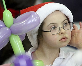 William D Lewis The Vindicator MaryKay Spitler, 7, (correct) dons festive attire during Struthers Rotary Christmas party 12-17-13 at Struthers Presbyterian Church. She is a student at Campbell elem School.