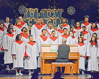 The choir at the Chaney Visual and Performing Arts School sings during dress rehearsal for the Holiday Spectacular public performance today at 6 p.m. Tickets are $4 for adults and $3 for students and are available at the door. The choir and other VPA students also will perform at 12:30 p.m. today and Friday for the student body.
