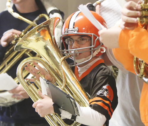 William D. Lewis The Vindicator  Niles Middle School 8th grade baritone horn player Jason Wodogaza plays along with the school band as the Bone Lady, super Browns fan Debra Darnall of Lakewood makes a grand entrance at Niles Middle School 12-18-13. She was there to speak to students and be taped for an upcoming ESPN feature.