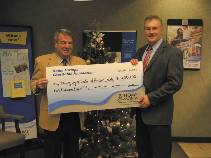 SPECIAL TO THE VINDICATOR
Home Savings and Loan Foundation recently made a donation of $5,000 to Housing Opportunities of Beaver County for annual program support, which provides foreclosure counseling services, credit repair and energy assistance and administers a first-time buyer program. Frank Wilson, left, is executive director of Housing Opportunities of Beaver County, and Richard Michaels, right, is branch manager of Home Savings Beaver office. For information regarding Housing Opportunities of Beaver County, call 724-728-7511 or visit hobcinfo.org.