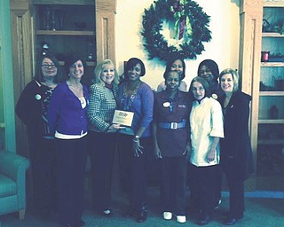 For the third year, Clare Bridge of Austintown was named top team for raising the most money in the Walk to End Alzheimer’s. The team that won this year is named Brookdale Alz Starz, which raised more than $3,500, the largest amount by a corporate team. Helen Paes, community development coordinator for the Alzheimer’s Association, and Theresa Depp, Family Service coordinator, presented a plaque. In front, from left, are Nickie Keagy, Heidi Polonus, Paes, Vanessa Montgomery, Darlene Ballard, Bernie Latosky and Andrea Capirano; in back are Sonya Bennett and Deborah Williams.
SPECIAL TO THE VINDICATOR