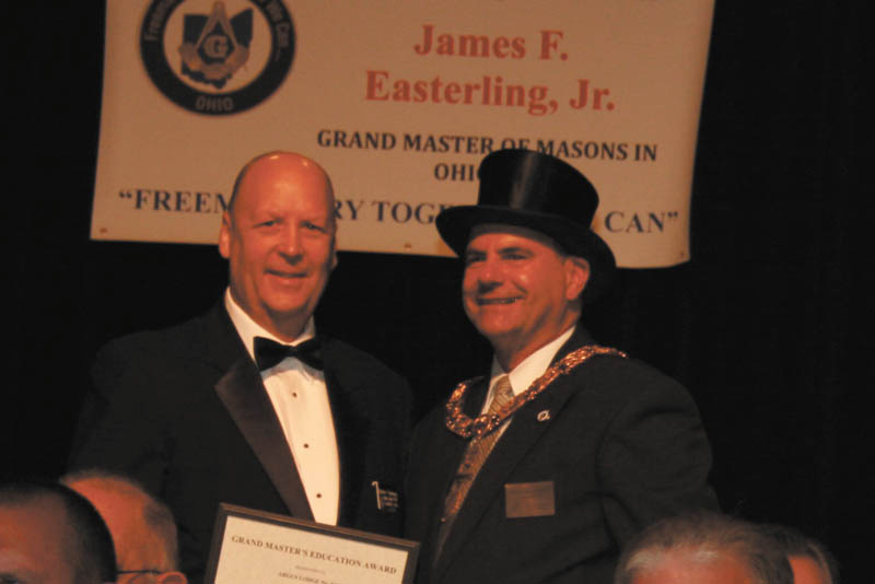 SPECIAL TO THE VINDICATOR
Denny Furman, left, Argus Lodge 545 F&AM education officer, was awarded the grand master’s education award by James P. Easterling Jr., grand master of Masons in Ohio, at the Ohio Masonic Grand Lodge annual meeting in Akron in October. The award recognizes the programs and practices that encourage excellence in the education of lodge members Furman has provided. He lives in Berlin Center with his wife, Mary Jo, where they own and operate Denny’s Auto Supply.