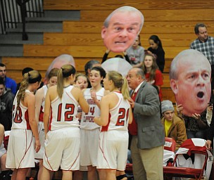 Columbiana head coach Ron Moschella talks to his starters including #21 Lauren Schlueter, #12 Aleah Whitacre, #10 Taylor Sims, #24 Emily Whitacre, and #5 Baylie Mook during a time out during the 1st half of Monday nights game.