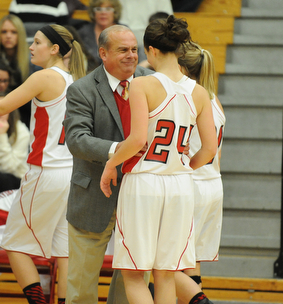 Columbiana head coach Ron Moschella smiles while talking to #24 Emily Witmer during the 2nd half of Monday nights game.