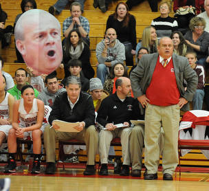 Columbiana head coach Ron Moschella coaches from the sideline during the 2nd half of Monday nights game.