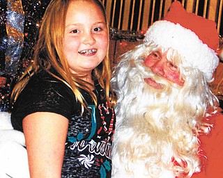 VFW Post 93, 2912 South Ave., Youngstown, recently hosted its annual Children’s Christmas Party to benefit the families of post members. More than 40 children attended, and each one received food, treats and a gift. Above is guest Isabella Arigoni, 10, who shared her Christmas list with Santa, as did Mason Dutton, 2, below. 
