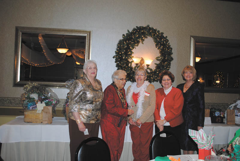 SPECIAL TO THE VINDICATOR
The Niles Chapter of the American Sewing Guild had its holiday party and annual meeting early in December at Ciminero’s Banquet Center, where the members elected the 2014 chapter advisory board. From left to right are Lynn Price, treasurer; Gretchen Saunders, secretary; Karen Bandy, second vice president; Diane Wittik, first vice president; and Barb Tryon, president. For her important contributions to the Guild, Jodi Clark received the Member of the Year award. She coordinates special events and runs a sewing business from her home.