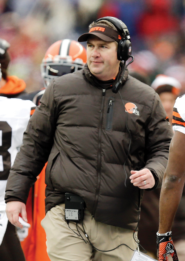 Cleveland head coach Rob Chudzinski walks the sideline during a game against the New England Patriots in Foxborough, Mass. After only one year as coach, Chudzinski was fired Sunday, just hours after the Browns’ final game — a 20-7 loss to the Pittsburgh Steelers at Heinz Field in Pittsburgh.
