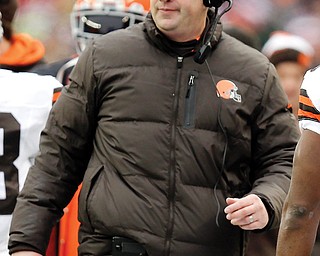 Cleveland head coach Rob Chudzinski walks the sideline during a game against the New England Patriots in Foxborough, Mass. After only one year as coach, Chudzinski was fired Sunday, just hours after the Browns’ final game — a 20-7 loss to the Pittsburgh Steelers at Heinz Field in Pittsburgh.