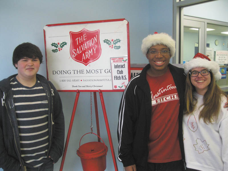 SPECIAL TO THE VINDICATOR
On Dec. 21 members of Fitch High School’s Interact Club donated time from their Christmas break to collect money for the Salvation Army at the Austintown Plaza. Members greeted patrons at the post office with a hearty Merry Christmas and opened doors for the customers. Some of those who donated their time were, from left, Justin Shaunesey, Ben Burney and Alison Rein.