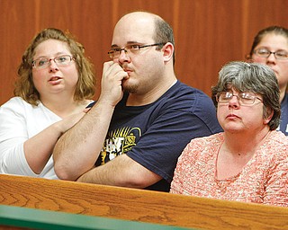 Shawn Tedesco, Teddy Foltz’s biological father, center, attends the arraignment of Zaryl Bush.
