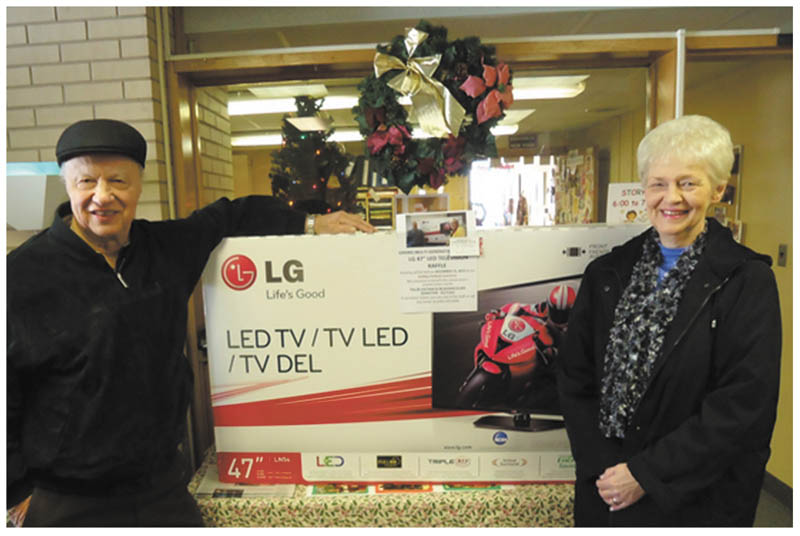 Special to The Vindicator: The Girard Multi-Generational Center sponsored a raffle recently for a 47-inch LG LED television. Winners of the TV above were June Phillips and her husband, George. Proceeds from the event benefited the center. For information about the programs and services offered at the center, call 330-545-6596 or visit www.multigen.org.
