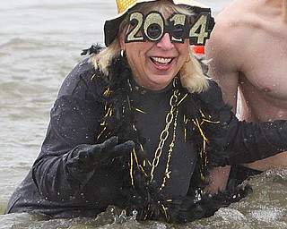 Mary Ann Slaven wore a costume when she took the plunge, which was sponsored by the Grandview Tavern in the Lake Milton/Craig Beach area.