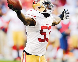 San Francisco inside linebacker NaVorro Bowman celebrates a fumble recovery against Arizona during a game in Glendale, Ariz. Bowman leads the defense for the 49ers (12-4), who open the playoffs with an NFC wild-card matchup at Green Bay on Sunday.