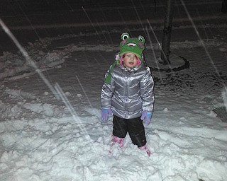 Bailey Christina Orr of Hubbard delights in playing in the snow.