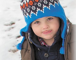 Hunter Campbell, 2 1/2, of Columbiana playing in the snow was sent by his mom, Rebecca Campbell.