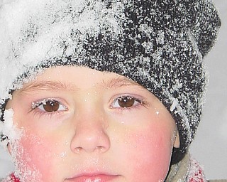 Ryan Thompson, now an eighth grade student at Springfield High School in New Middletown, is shown in January 2005, reminding us how much fun winter can be for children. Sent by Grandma Pat Shively of New Middletown.