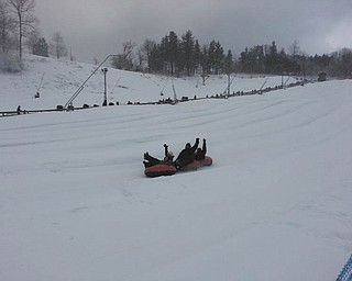 Jackie, Ray and Vincent Boila and Chris and Lauren Wilson are delighted with a day of fun on the slopes at Seven Springs. Submitted by Grandma Judy Wilson, who stayed warm in the ski lodge watching the little ones, Patrick Boila, 3, and Jack Wilson, 4 months.