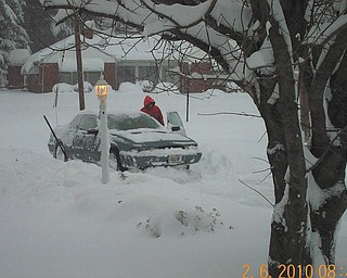 Feb. 6, 2010, Rick Mularchik of Struthers digging out.