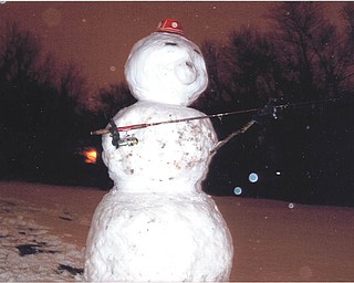 Robert Naples made a fishing snowman before Christmas. Submitted by his father, Tony Naples.