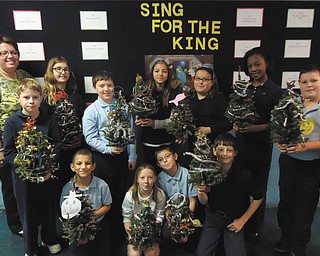 SPECIAL TO THE VINDICATOR
Fourth-graders at St. Joseph-Immaculate Heart of Mary School in Austintown show off the Christmas trees they made using their imagination and creating their own
ornaments. In front, from left to right are Peter Wolfe, Cadence Pounds, Trevor Saxton and Evan Madison. In back are teacher Melissa Chalker, Chase Pastor, Molly Burke, Connor Blazek, Allysa Leskovac, Lindsey Varso, Alaysia Griffin and Cameron Putteet.