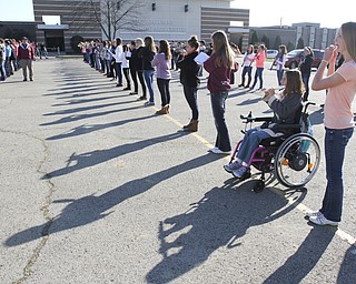 William D Lewis The Vindicator Kaitlin Windt at Boardman HS 10-30-13. She is in a wheelchair and performs with the Boardman Marching band.