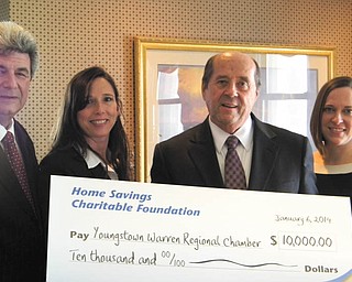 SPECIAL TO THE VINDICATOR
Home Savings Charitable Foundation recently donated $10,000 to the Youngstown Warren Regional Chamber of Commerce Foundation, the funding arm of the chamber’s economic development division. The funds will be used to work with companies interested in expanding their businesses or locating in Trumbull and Mahoning counties. From left, Patrick Bevack, president and CEO of Home Savings, and Pamela Berry, director of Home Savings Charitable Foundation, presented a check to Thomas Humphries, president and CEO of the Regional Chamber, and Sarah Boyarko, vice president of economic development, North America, Regional Chamber.