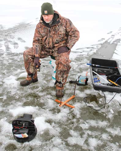 Bob Edwards of Minerva chose to go ice fishing at Berlin Lake.