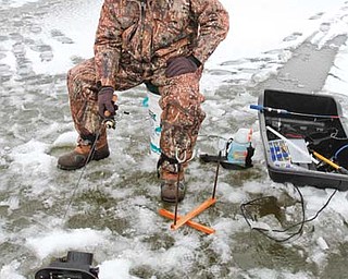 Bob Edwards of Minerva chose to go ice fishing at Berlin Lake.