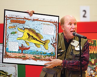 Buck Wilder, also known as Tim Smith, tells about his style of writing and hiding objects in every page of his books. Smith visited Austintown Intermediate School on Tuesday to get the students excited about reading
nonfiction.