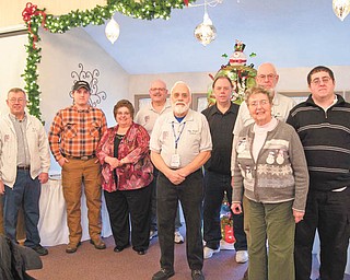 SPECIAL TO THE VINDICATOR
New officers of the Western Reserve Amateur Radio Club were installed recently. From left to right are Steve Fabry, trustee; Chris Monske, trustee; Maureen Stein, treasurer; Joe Wojtowicz, vice president; Roy Haren, president; Harry Harker, trustee; Allan Avnet, past president; Jane Avnet, newsletter/Web; and Kevin Stein, secretary.