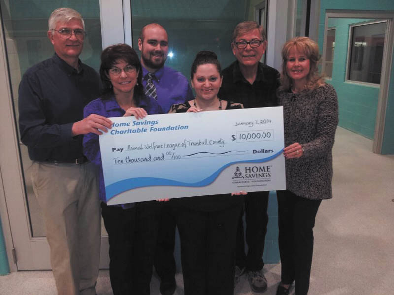 SPECIAL TO THE VINDICATOR
Home Savings Charitable Foundation recently donated $10,000 to the Animal Welfare League of Trumbull County for its building campaign for the new shelter in Vienna. The new shelter will include adoption rooms, areas for medical care, quarantine, isolation and maternity wards and areas for training and behavior. It will be an accredited Veterinary Technician Program in partnership with Kent State University. From left to right are Jeff Williams, D.V.M. and board president of Animal Welfare League of Trumbull County; Nancy Jastatt-Juergens, AWL board member; Andrew Nemergut, retail manager, Home Savings Eastwood office; Traci Vigorito, retail manager, Home Savings Howland office; Rufus Sparks, AWL board treasurer; and Caryn Covelli, AWL board member.