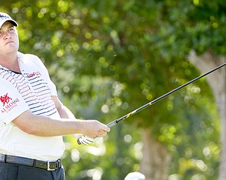 Jason Kokrak watches the flight of his golf ball off the first tee during Round 3 of the Sony Open in Honolulu. In the midst of his third full year on the PGA tour, Kokrak, a Warren JFK grad, has developed a comfort level both on and off the course that he feels will help lead him to his first Tour win.