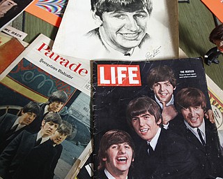 ROBERT K. YOSAY | THE VINDICATOR..The Beatles 50 years later ..Linda Linonis and her cousin, Patti Albert, saw the Beatles at Cleveland Auditorium; they have some Beatles memorabilia and ticket stubs from that concert........ - -30-.