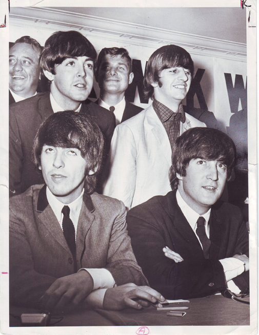 PDHST Plain Dealer Historical Photographic Collection..Plain Dealer historic photo collection.  ..Beatles at a press conference on September 15, 1964 in Cleveland, OH.  Standing:  Paul McCartney and Ringo Starr.  Sitting:  George Harrison and John Lennon...Photo by Robert J. Quinlan, Plain Dealer photographer...The Beatles....