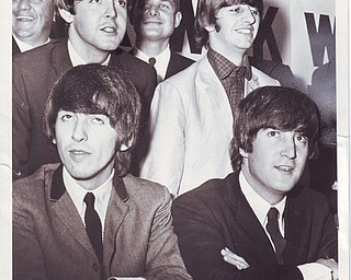 PDHST Plain Dealer Historical Photographic Collection..Plain Dealer historic photo collection. ..Beatles at a press conference on September 15, 1964 in Cleveland, OH. Standing: Paul McCartney and Ringo Starr. Sitting: George Harrison and John Lennon...Photo by Robert J. Quinlan, Plain Dealer photographer...The Beatles....