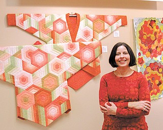 Cheryl Deibel, of Canfield specializes in quilting kimonos. She has a show of her colorful quilted works, including those seen in these photos, at the Nissen Gallery at ValleyCare Trumbull Memorial Hospital in Warren
through March 5.