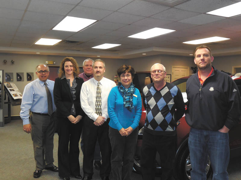 SPECIAL TO THE VINDICATOR
The Columbiana Area Chamber of Commerce met for its quarterly Business Showcase in January. Hosting the event was Columbiana Buick, Cadillac, Chevrolet, and the chamber introduced six members who presented information about their businesses and services. From left to right are Nick DiNunzio of the car dealership, Dee McFarland of National Healthcare Access, Pat Macleese of Columbiana Meals on Wheels, Dr. Chad Moreschi of Columbiana Vision Care, Cheryl Luli of Harmony Village, Chuck Siman of On Demand Drug Testing and Shawn Pruitt of C. Tucker Cope.