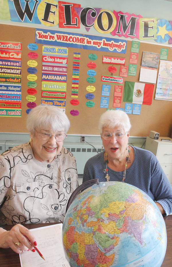 Leslie Kiske, left, and Bobbi Grinstein sit in one of the classrooms at The English Center. They founded the center when The International Institute in Youngstown closed in 1986. The center currently has 102 students from 32 countries.