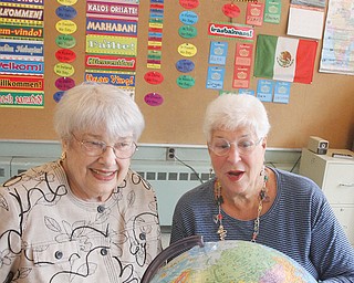 Leslie Kiske, left, and Bobbi Grinstein sit in one of the classrooms at The English Center. They founded the center when The International Institute in Youngstown closed in 1986. The center currently has 102 students from 32 countries.