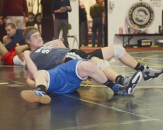 Girard wrestler Nick Cardiero practices against Corley Lamb of Jackson-Milton during state wrestling media day Tuesday at Canfield High School. Cardiero will be competing in the 170-pound weight class at the Division III tournament this weekend in Columbus. It is his first trip to state. Lamb will attend as an alternate for the Bluejays.