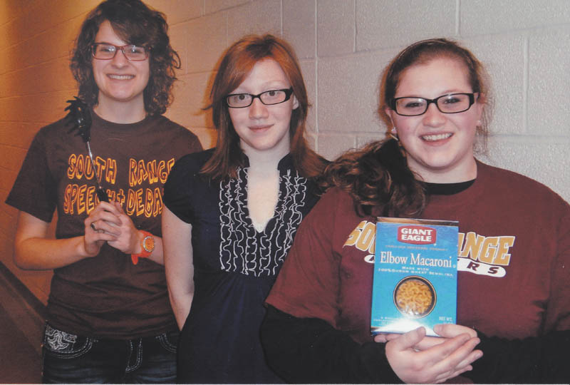 SPECIAL TO THE VINDICATOR

The South Range High School Show Choir seniors are preparing for the South Range Music Boosters pasta dinner, which will take place from 4 to 8 p.m. March 6 at the high school. Seniors, from left, are Emily Erb, Kelsey Gorcheff and Meagan Daugherty. There also will be a basket auction and a 50-50 raffle, and the school choirs and bands will perform.