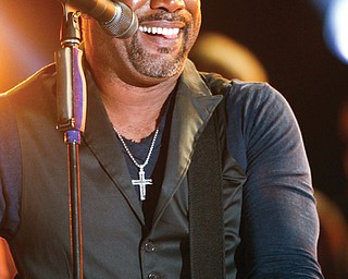 Darius Rucker performs at the 47th annual CMA Awards with a performance of "Wagon Wheel" at Bridgestone Arena on Wednesday, Nov. 6, 2013, in Nashville, Tenn. (Photo by Wade Payne/Invision/AP)