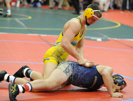 Zach Jamieson of Brookfield has his wrist controlled by Jake Datz of London Madison Plains during their 170lb Division 3 championship bracket bout during the State High School Wrestling meet on February 27, 2014 at Jerome Schottenstein Center in Columbus, Ohio.