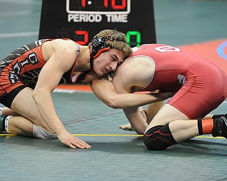 Nick Cardiero of Girard looks for a opening to make a move on Jared Pack of Centerburg during their 170lb Division 3 championship bracket bout during the State High School Wrestling meet on February 27, 2014 at Jerome Schottenstein Center in Columbus, Ohio.