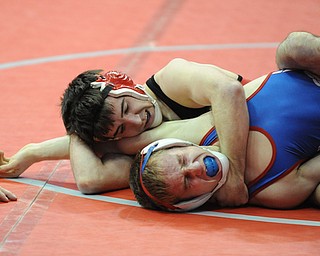 Korey Frost of Canfield scores points with a near fall of Mike Stewart of Marengo Highland during their 120lb Division 2 championship bracket bout during the State High School Wrestling meet on February 27, 2014 at Jerome Schottenstein Center in Columbus, Ohio.