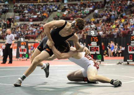 David-Brian Whister of Howland slips out of a takedown attempt from Andrew Dunn of Hamilton Ross during their 152lb Division 2 championship bracket bout during the State High School Wrestling meet on February 27, 2014 at Jerome Schottenstein Center in Columbus, Ohio.