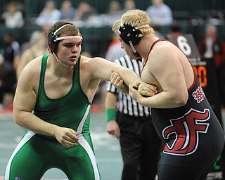 Logan Sharp of West Branch attempts to free his arm from the control of Chase Henderson of Franklin during their 285lb Division 2 championship bracket bout during the State High School Wrestling meet on February 27, 2014 at Jerome Schottenstein Center in Columbus, Ohio.